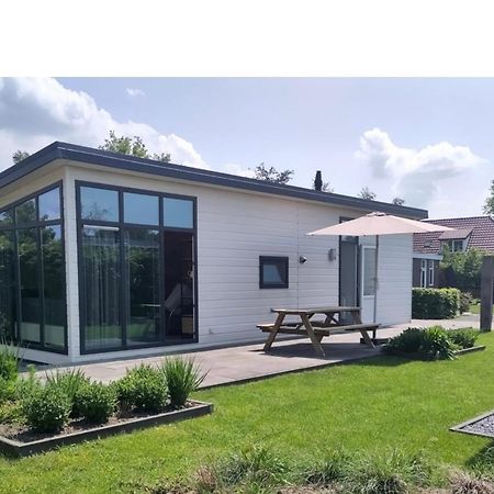 Knus Chalet Heidebloem Putten Kültér fotó