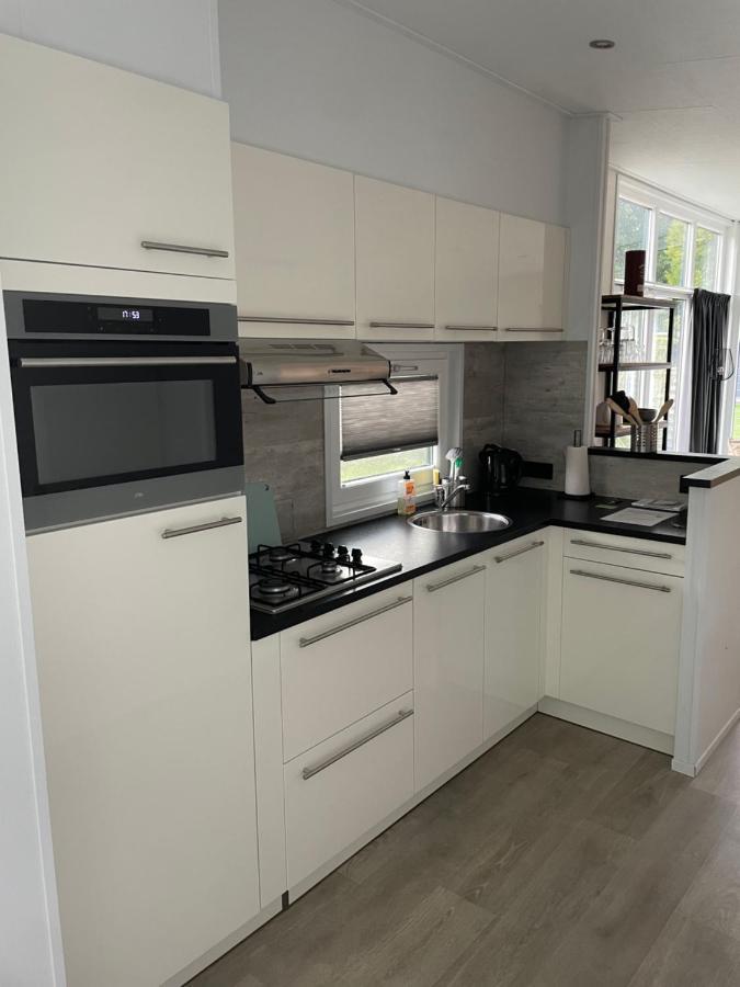 Knus Chalet Heidebloem Putten Kültér fotó